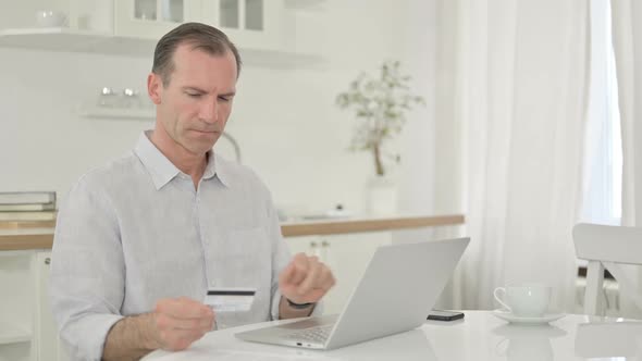 Middle Aged Man with Online Payment Failure on Smartphone
