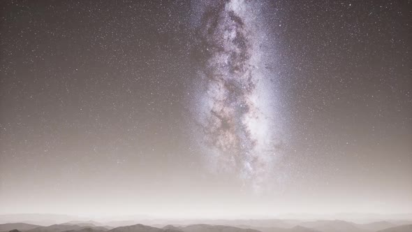 Milky Way Above Snow Covered Terrain alt