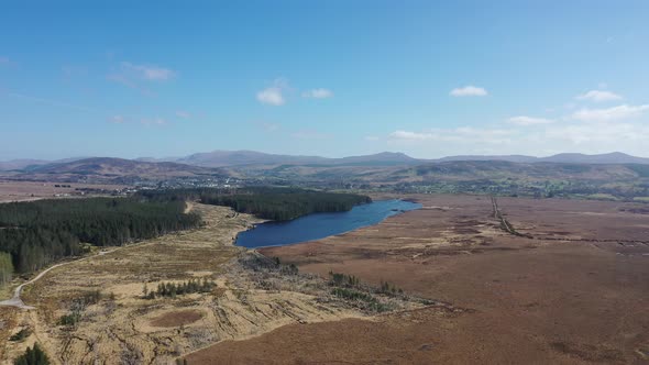 Aerial View of Peatbog and Lake Ananima Next to the Town Glenties in County Donegal  Ireland