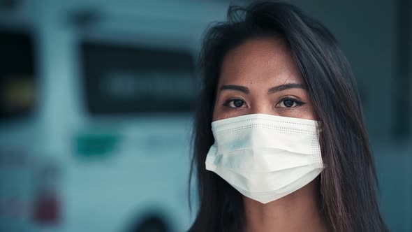 Young Asian Woman Wearing a Medicine Mask