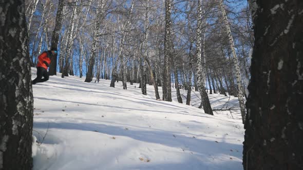 Man Running at the Mountain with Snow