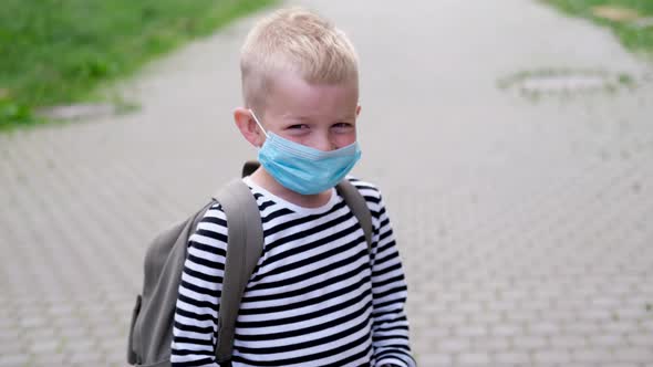 Caucasian Children in Mask on Street