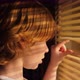 Young blond boy looking through windows blinds - VideoHive Item for Sale