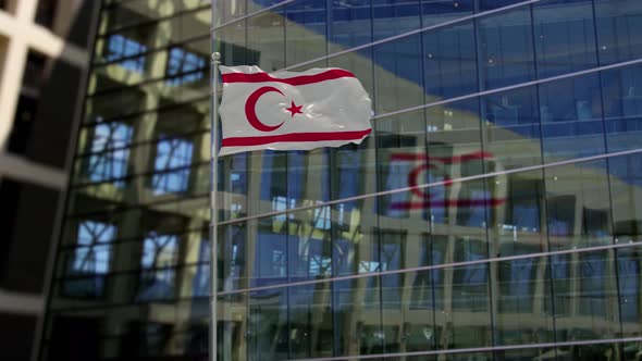Turkish Republic of Northern Cyprus Flag Waving On A Skyscraper Building alt