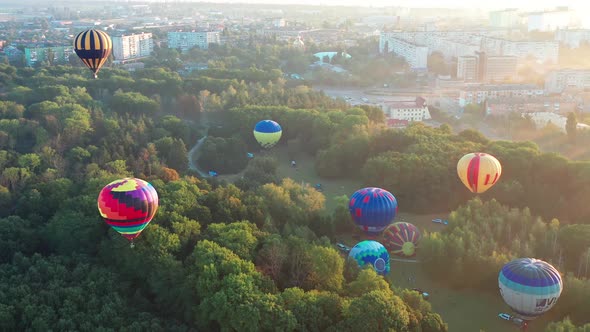 Beautiful top view of the balloons. Balloons fly over the park.