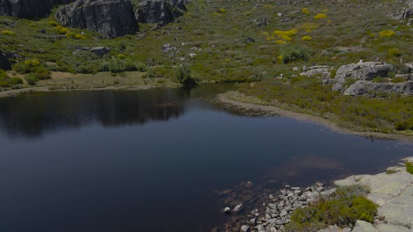 A drone pushes over tourists and the waters at Covão dos Conchos