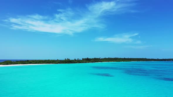 Aerial seascape of beautiful sea view beach break by blue lagoon with white sand background of a day