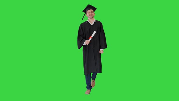 Happy Graduation Student Walking To the Graduation Ceremony on a Green Screen Chroma Key