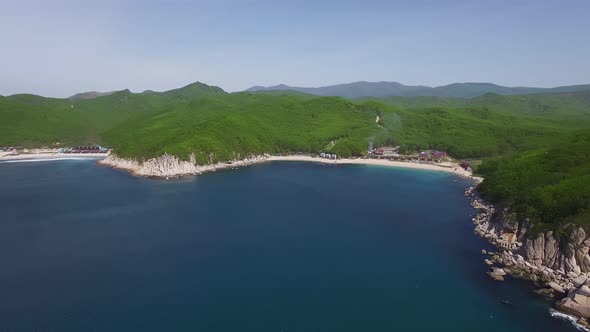 Aerial View of the Beautiful Sea Coast with Clear Blue Water