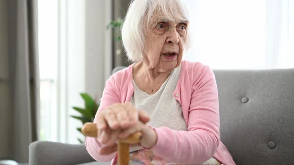 Senior Woman and Walking Stick