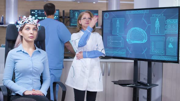 Female Doctor in Brain Activity Making Hand Gestures