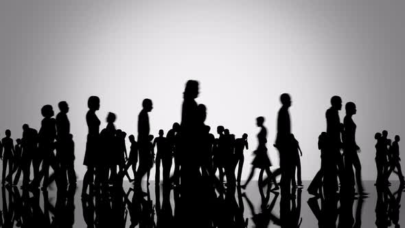 Silhouettes of a crowd of people. Big city life. Slowly moving camera position.