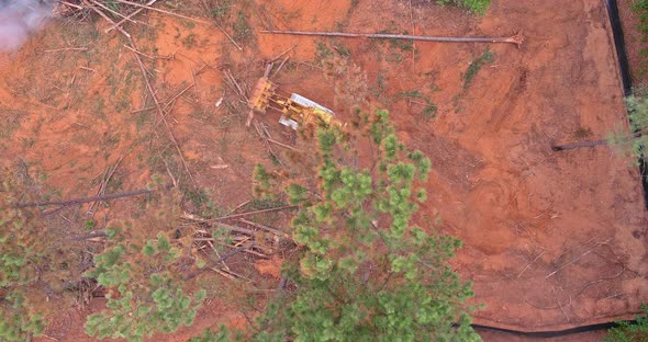 Preparation of Deforested Land Prior to Construction of a New Subdivision By a Dozer