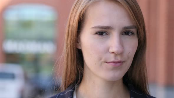 No, Businesswoman Rejecting Offer by Shaking Head