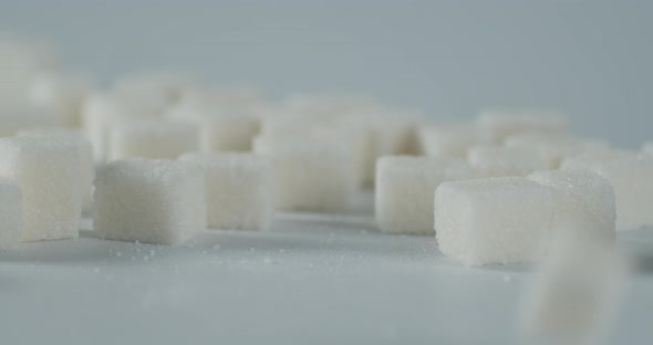 Sugar Cubes Fall on the Table