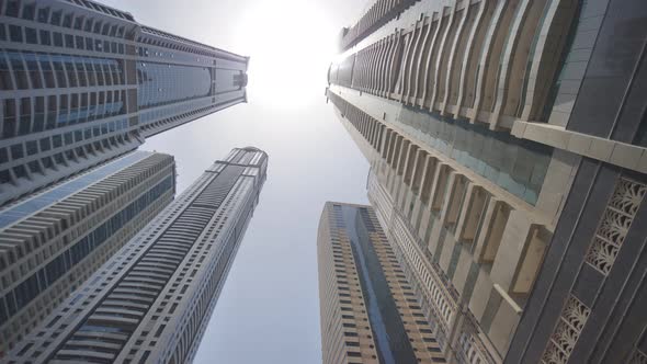 High-rise Skyscrapers of Dubai. Shooting in Motion and Rotation