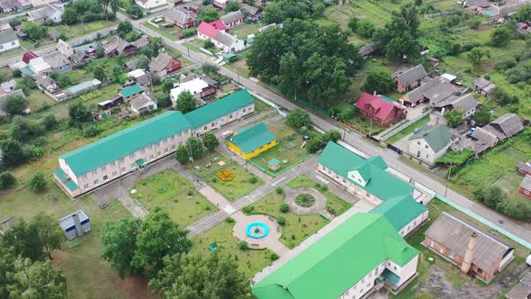 Aerial drone of Klevan town buildings and homes in Rivne Oblast Ukraine. Filmed on a summer day in A