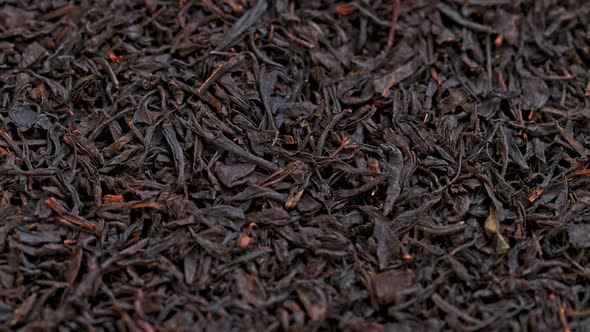 Looped Spinning Dry Black Tea Full Frame Closeup Background