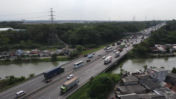 Aerial view of Indonesia Highway with busy traffic.