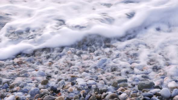 Pebbles on beach, close up