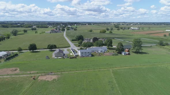 Aerial View of Amish Church Meeting with Horse and Buggies