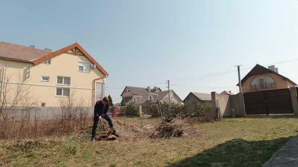 Man Chopping Tree Roots Slow Motion