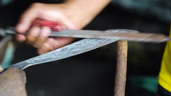 Sharpening a Machete with a Rasp