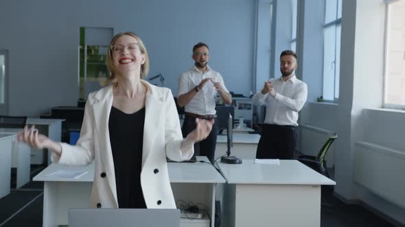 Great Work of a Young Woman with Red Lips in Office