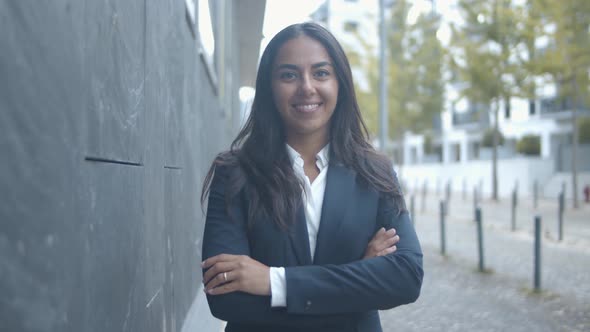 Happy Pretty Latin Business Woman in Suit