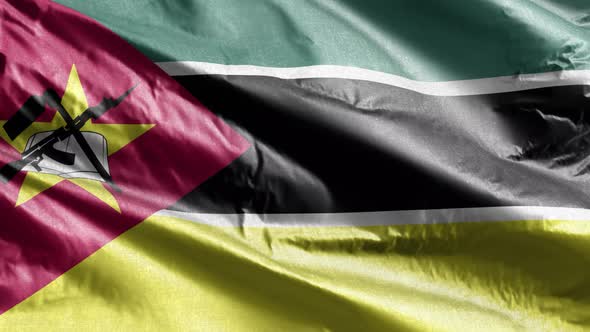 Mozambique flag waving on the wind. Slow motion. 20 seconds loop.