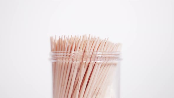 Toothpicks Rotate on a Grey Background