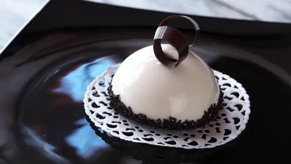 French Mousse Cake Covered with White Glaze