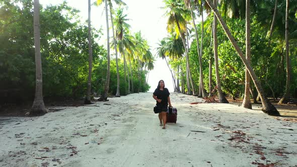 Single lady tanning on relaxing resort beach adventure by blue lagoon with clean sand background of 