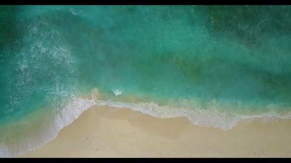 Aerial drone texture of marine coast beach time by clear sea with white sandy background of a dayout
