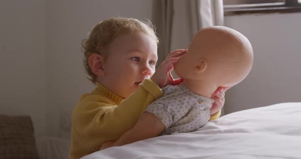 Side view of caucasian baby at home