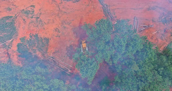 A Dozer Used to Clean Up a Uprooted and Deforested During the Process of Before Construction and