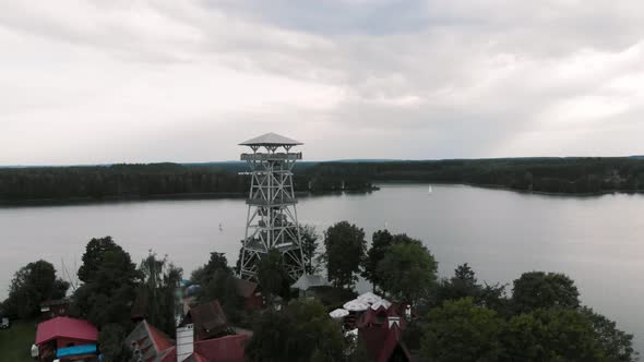 Aerial shot of Wdzydzki Park Krajobrazowy in Kaszuby, Poland with view of observation tower in Wdzyd