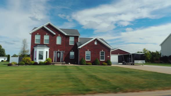 Drive Along Typical American Suburbs - Well-groomed Lawns and Houses