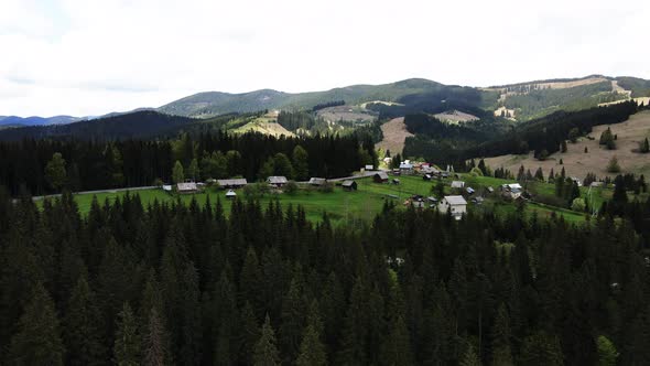 Village in the Mountains. Slow Motion. Carpathians. Ukraine. Aerial