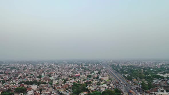 Side Moving Aerial Shot of A Highway in Mathura , India 