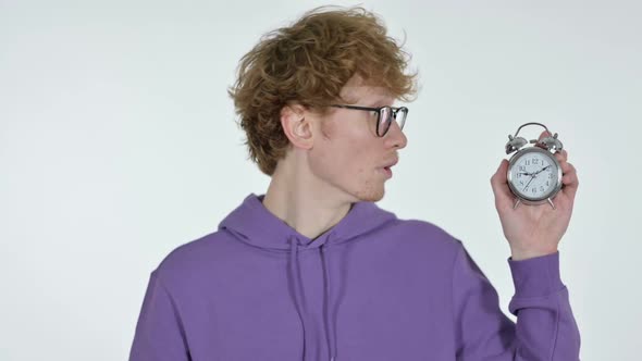 Already Late Shocked Redhead Young Man Holding Clock White Background