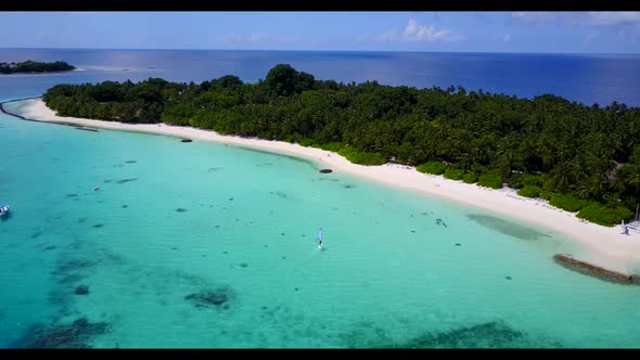 Aerial top down seascape of relaxing coastline beach voyage by transparent water and white sandy bac