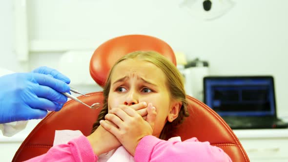 Young patient scared during a dental check-up