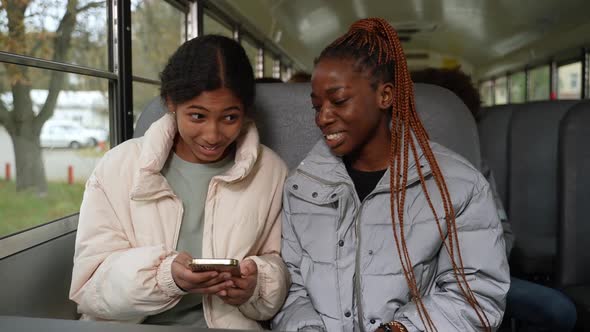 Cheerful Multinational Friends Riding School Bus