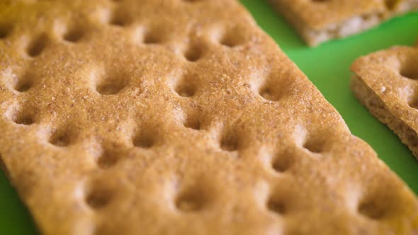 Delicious and Crispy Dietary Bread on the Green Table