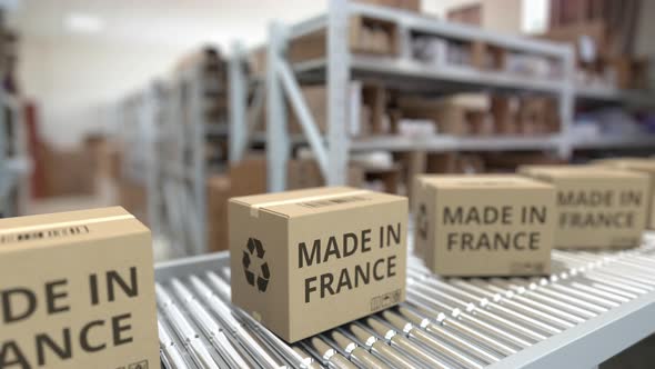 Boxes with MADE IN FRANCE Text on Conveyor