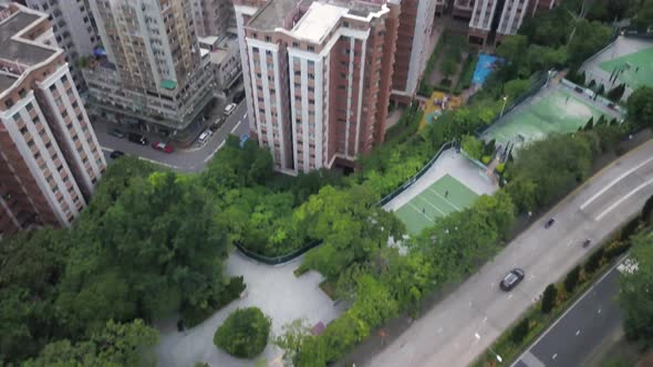 Tilt up aerial view of Hong Kong skyline from Tsum Shui Po