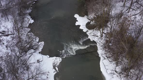 icy winter river mini waterfall smooth overhead view