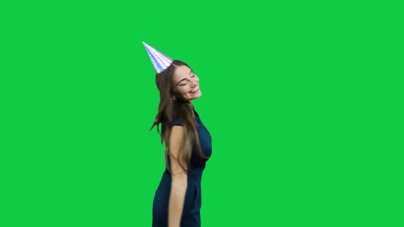 Happy birthday girl dancing in front of the green screen