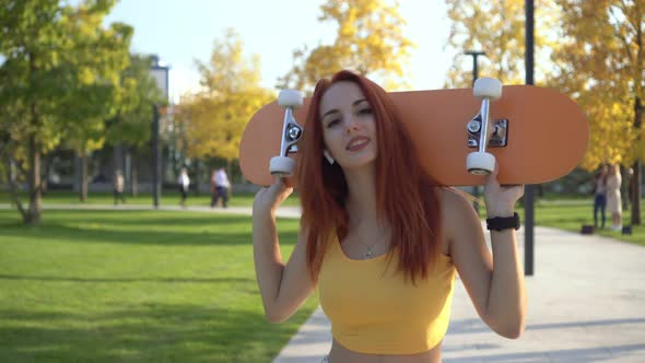 Happy Young Teen Woman in Summer Park